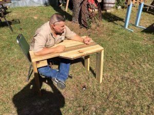 Adam Collette with a new rifle bench